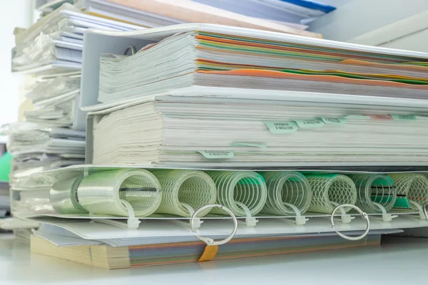 Machine manual books stacking together