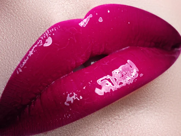 Perfect fuchsia lips. Sexy girl mouth close up. Beauty young woman smile. Fuchsia plump full Lips. Lips augmentation. Close up detail. Bright full lips