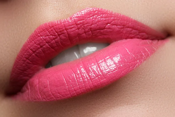 Sexy woman\'s lips. Beauty pink lips make-up. Beautiful make-up. Sensual open mouth. Lipstick and lip gloss. Natural full lips.
