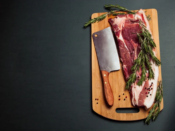 Pork meat on cutting board