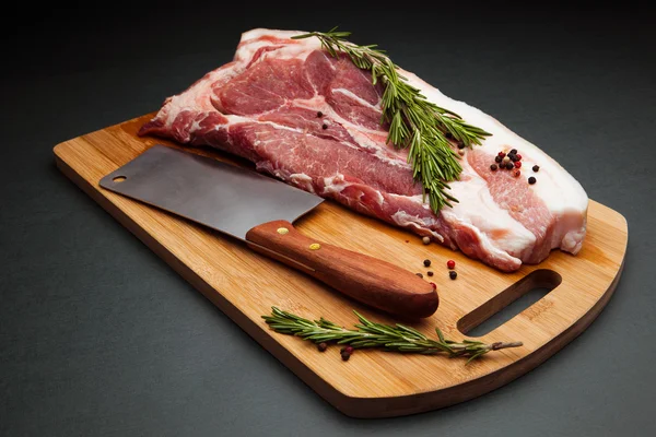 Pork meat on cutting board