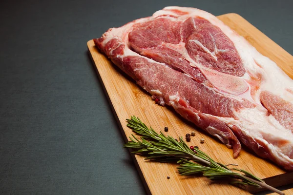 Pork meat on cutting board