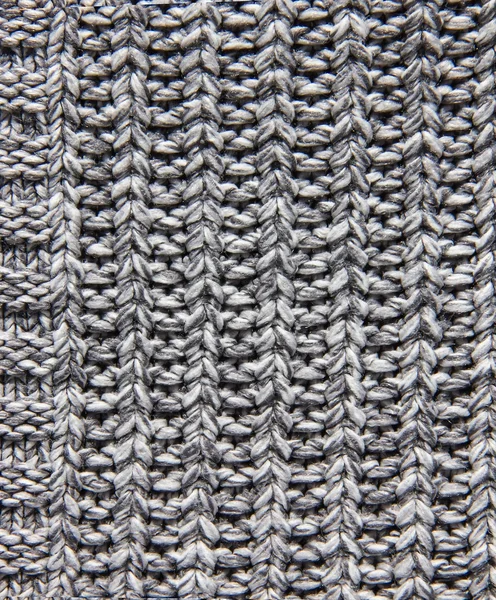 Texture of knitted fabric, knitted gray background, Melange wool