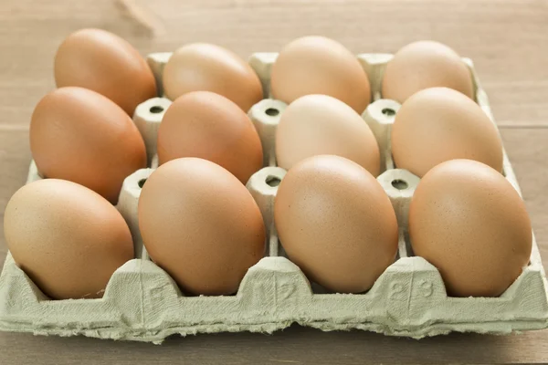 Chicken eggs in an egg cup