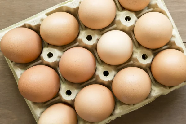 Chicken eggs in an egg cup