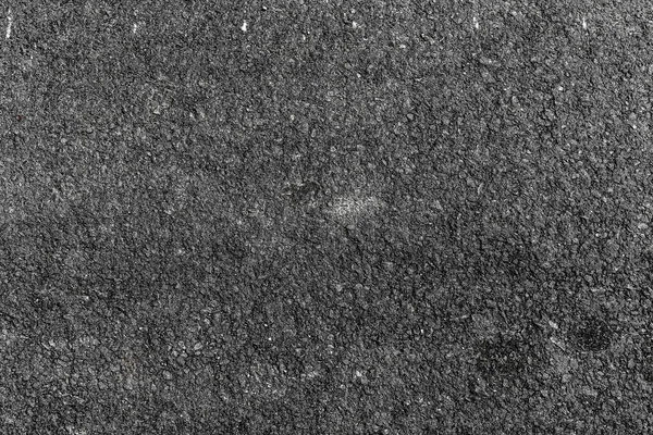 Dirty asphalt road texture background