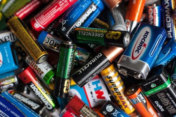 Color batteries of different sizes on a white background isolate