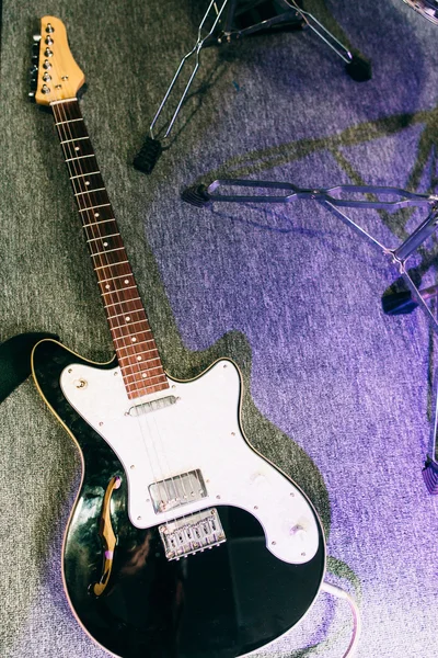 Electric guitar in sound recording studio