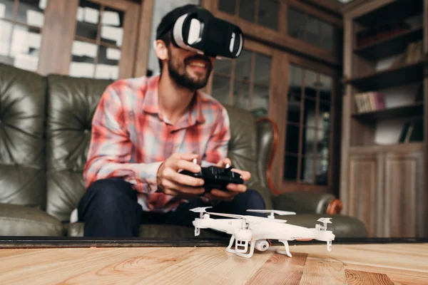 Man try to control drone in vr glasses