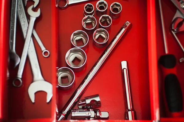 Repairman red toolbox with wrench kit