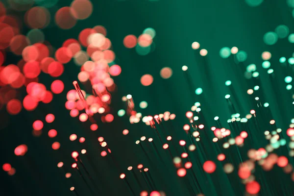 Red and green illuminated optical fibers