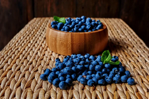 Blueberries on rattan table