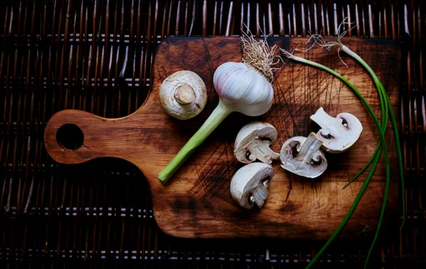 There are fresh vegetables on the table rattan