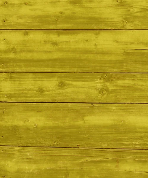 Yellow wet wooden hangar wall.