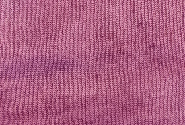 Dirty magenta cloth texture.