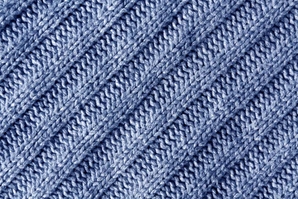 Abstract blue knitted cloth texture.
