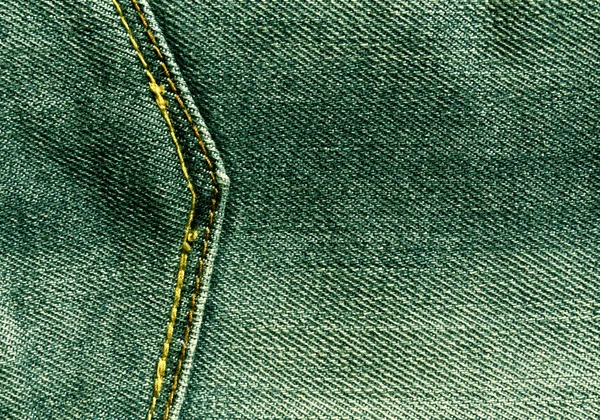 Green jeans with pocket texture.