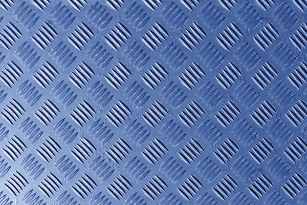Blue metal textured floor surface.