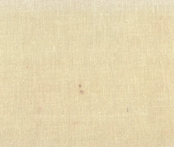 Dirty beige color textile book cover surface.