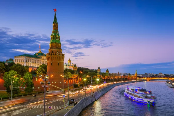 View Vodovzvodnaya Tower of the Moscow Kremlin and the Kremlin embankment to the Great Stone Bridge in the evening