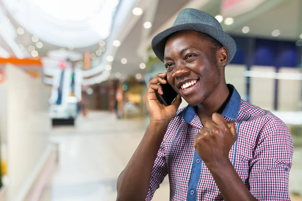 African man with phone