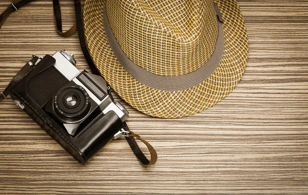 Vintage camera on wooden table