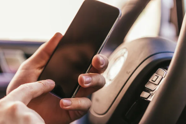 Man holding digital device