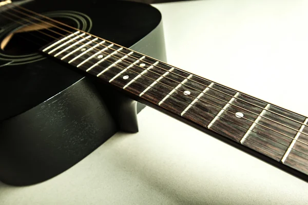 Classic black guitar body and neck detail