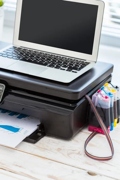 Printer and computer on the table