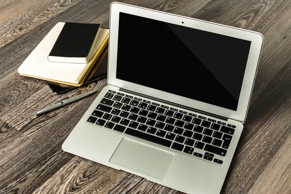 Laptop on wood table