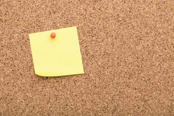 Wooden board with blank sticky notes