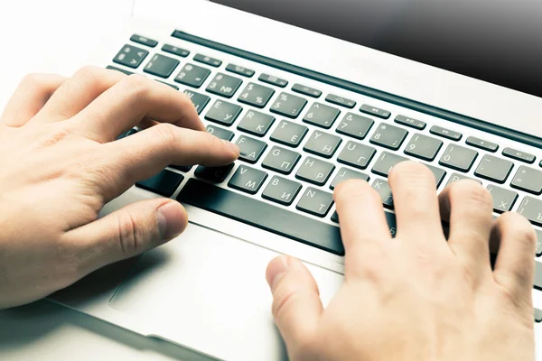 Male hands on keyboard