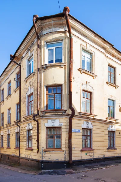 Old house in Vyborg, Russia. Building with old fashioned windows and downpipes.