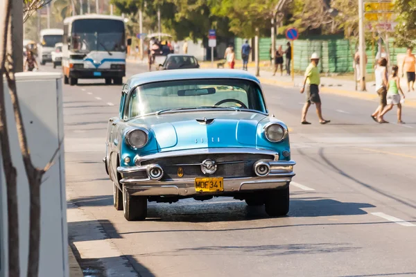 VARADERO, CUBA - February 8, 2008. Classic oldtimer car on street. Most of the Cubans drive cars that were on the road before 1959.