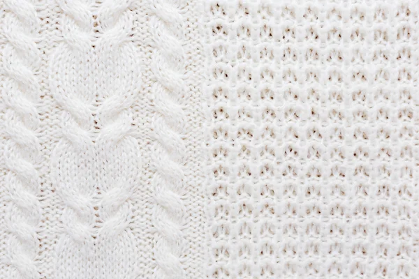 Abstract knitted background. Wool white sweater texture. Close up picture of  knitted pattern.