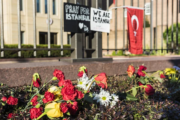 Washington D.C., USA - June 29, 2016: Flowers and posters at Turkish Embassy to honor lives lost in Istanbul bombings of June 28, 2016