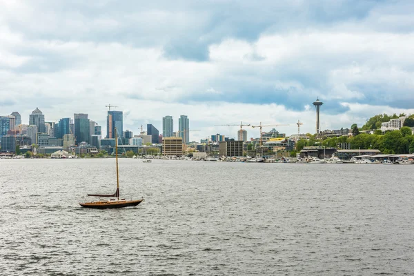 Seattle skyline with bay and boat from Gas Works Park