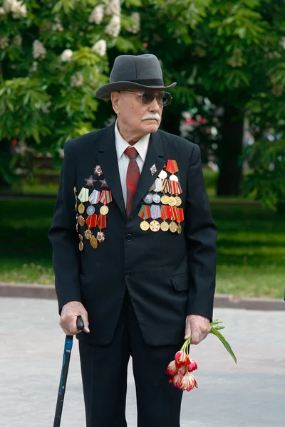 Volgograd, Russia - May 9, 2008: World War II veteran on Victory Day celebration  on the Ploshhad\' Pavshih Borcov (the Square of the Fallen Fighters) in Volgograd