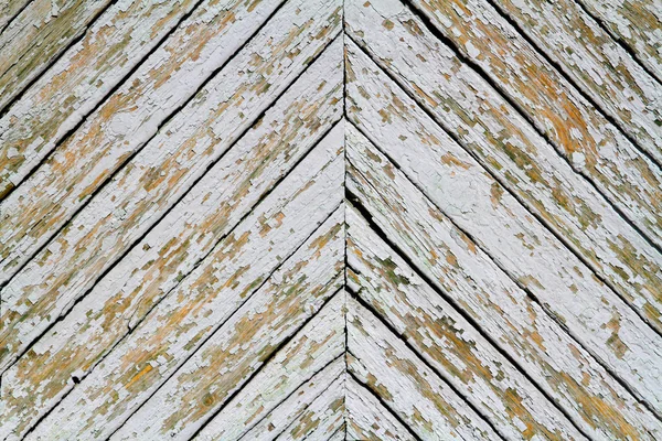 Old grey wood plank in a herringbone pattern
