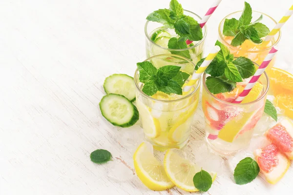 Summer drinks water with ice, mint, cucumber and citrus, copy sp