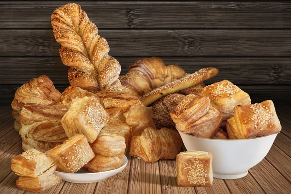 Bunch of Croissant Puff Pastry Sprinkled With Sesame Seeds Placed on Bamboo Place Mat