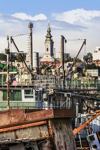 Old Towboats Cranes Barges and Dredgers at The Ship Junkyard on Sava River, Belgrade, Serbia