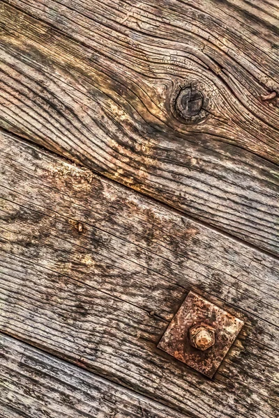Old Weathered Knotted Planks With Rusty Screw With Nut and Large