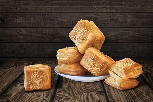 Serbian Zu-Zu Small Square Shaped Croissant Puff Pastries on Rustic Wooden Table