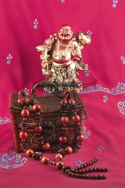 Statue of Buddha, jewelry box, necklace made of wood