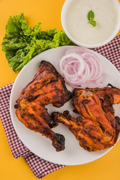 Tandoori chicken leg, Tandoori Chicken , Indian spicy food, Delicious Tandoori chicken leg piece with Salad, India
