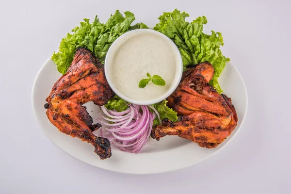 Tandoori chicken leg, Tandoori Chicken , Indian spicy food, Delicious Tandoori chicken leg piece with Salad, India