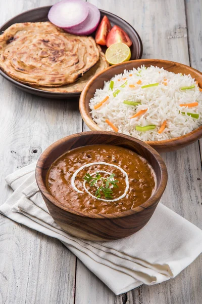 Dal Makhani or daal makhni or Daal makhani, indian lunch/dinner item served with plain rice and butter Roti, Chapati, Paratha and salad