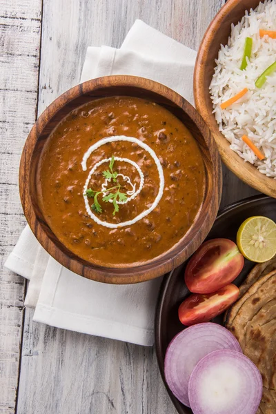 Dal Makhani or daal makhni or Daal makhani, indian lunch/dinner item served with plain rice and butter Roti, Chapati, Paratha and salad