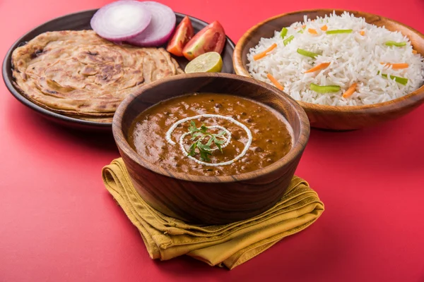 Dal Makhani or daal makhni or Daal makhani, indian lunch/dinner item served with plain rice and butter Roti, Chapati, Paratha and salad